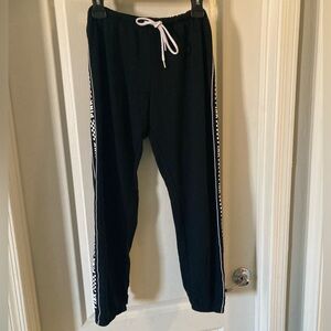 PINK joggers. size medium. checkers pattern on the sides of the legs.